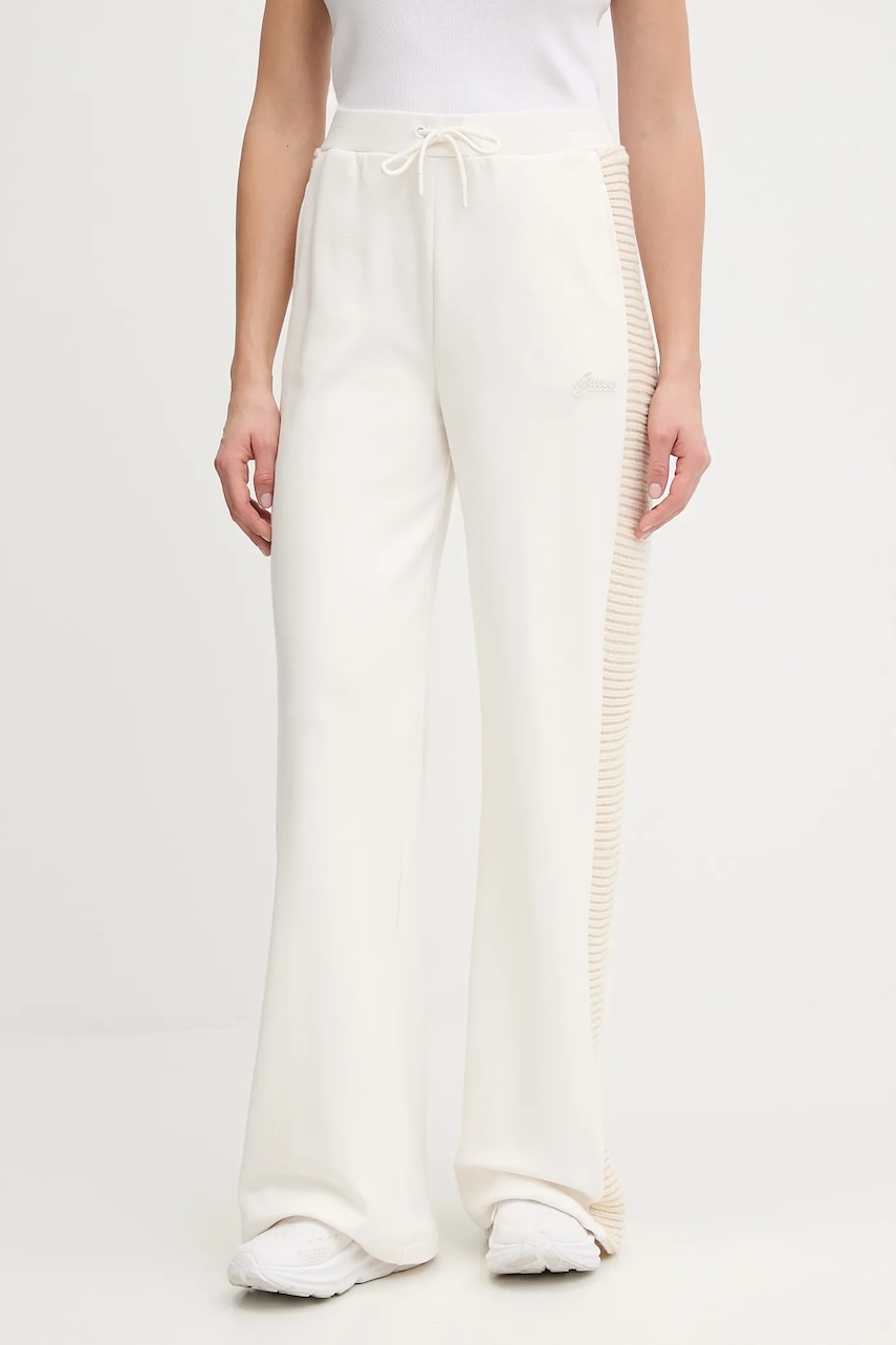 Levně Tepláky Guess DORA dámské, béžová barva, V5BB11 K1981