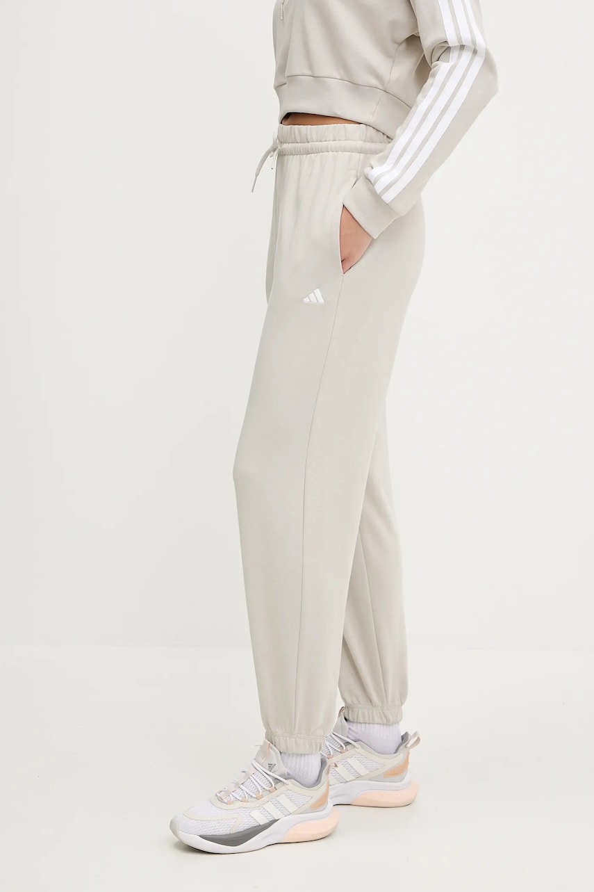 adidas pantaloni de trening Essentials culoarea bej, neted, JC8305