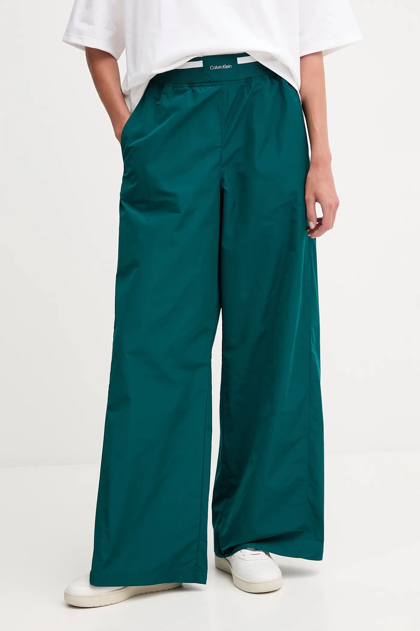 Levně Kalhoty Calvin Klein Jeans dámské, zelená barva, široké, high waist, LV044D609G
