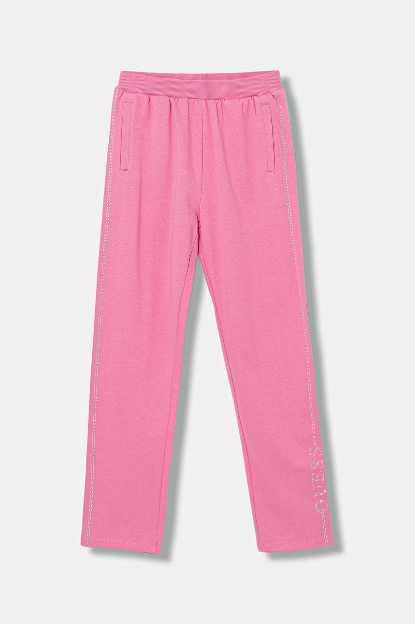 Levně Dětské bavlněné tepláky Guess růžová barva, s aplikací, J5YQ12 KA6R4