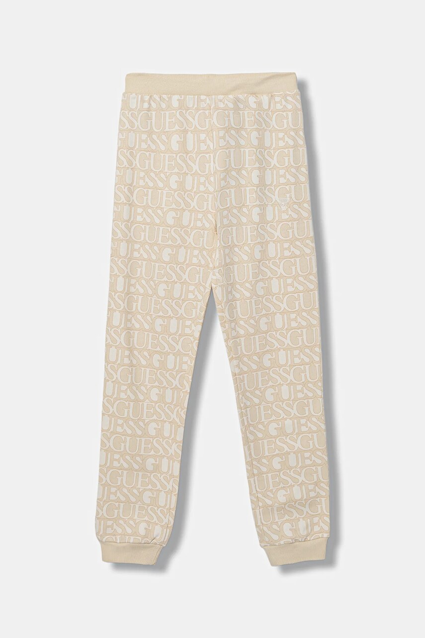 Levně Dětské bavlněné tepláky Guess béžová barva, J5YQ13 KAD74