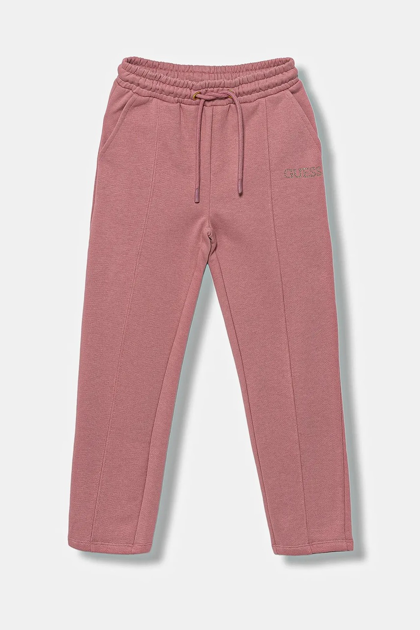 Levně Dětské bavlněné tepláky Guess růžová barva, s aplikací, J5YQ17 KAV34