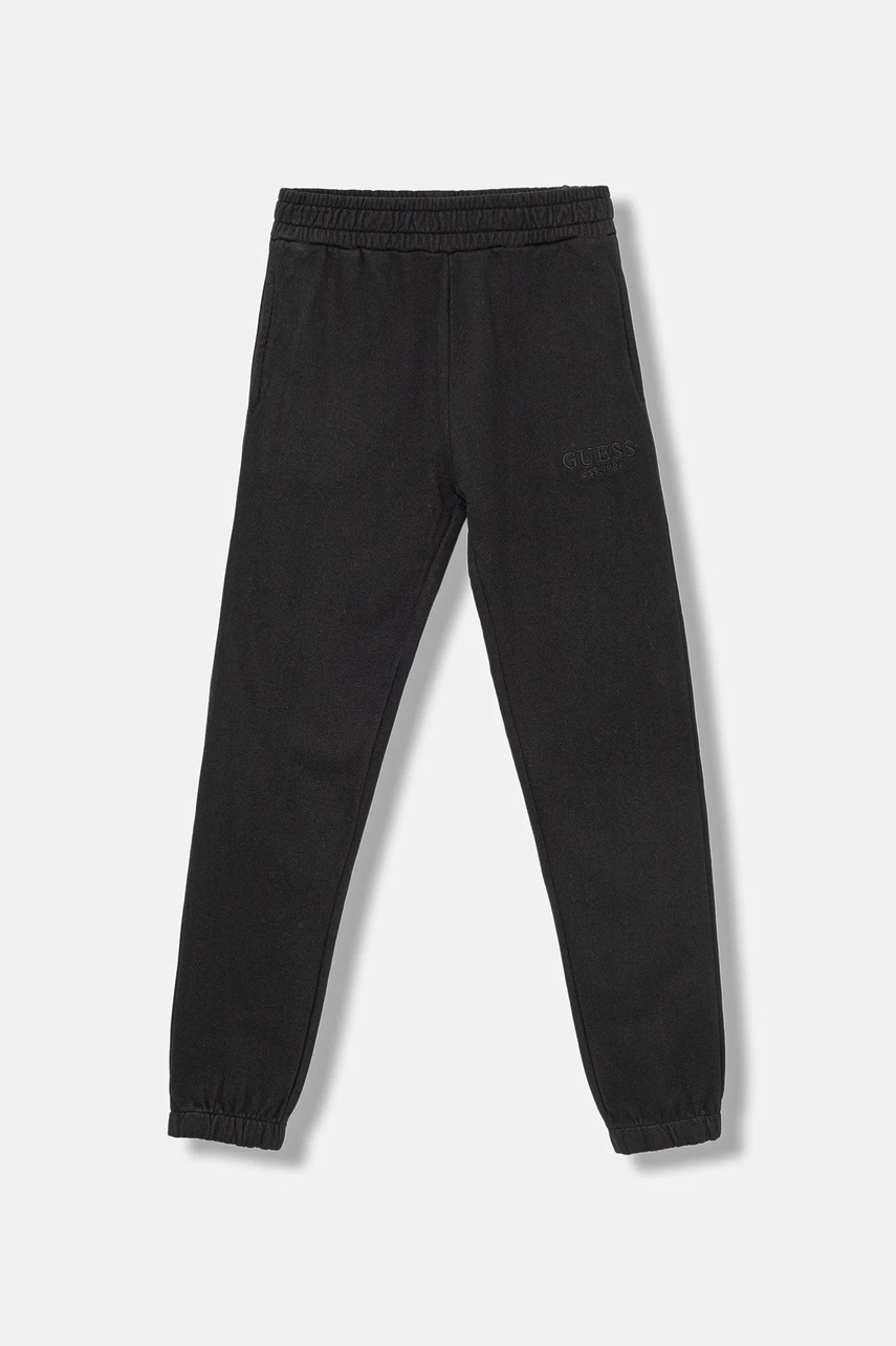 Levně Dětské bavlněné tepláky Guess černá barva, J5YQ18 KAV34