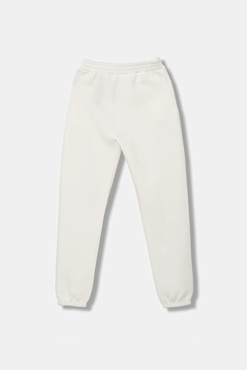 Детские спортивные штаны Guess цвет бежевый однотонные J5YQ27 K7UW2