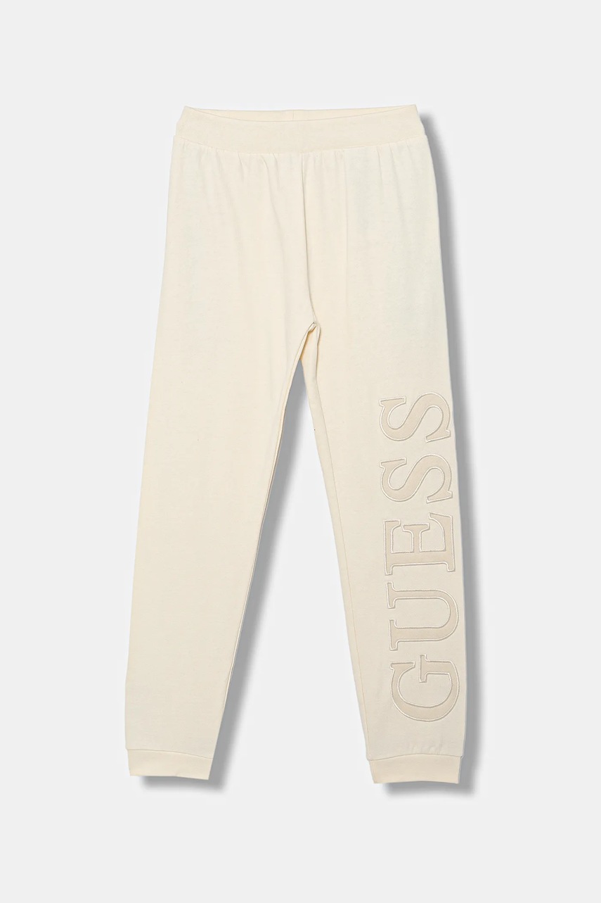 Levně Dětské tepláky Guess béžová barva, s aplikací, J5BQ14 KAX74