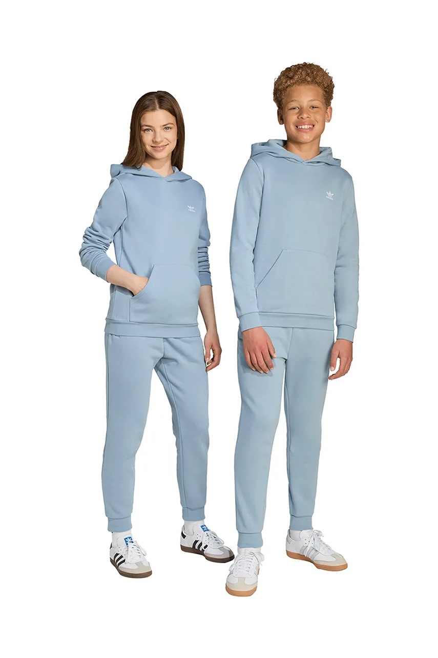 Levně Tepláky adidas Originals modrá barva, JX2743