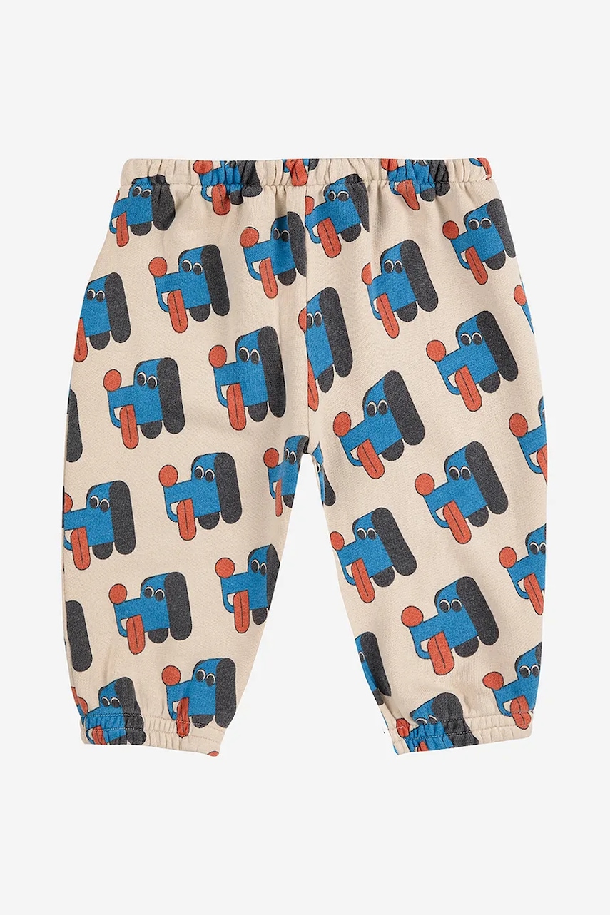 Bobo Choses pantaloni de trening din bumbac pentru bebeluși Doggy Mate culoarea bej, cu imprimeu, 225AB079