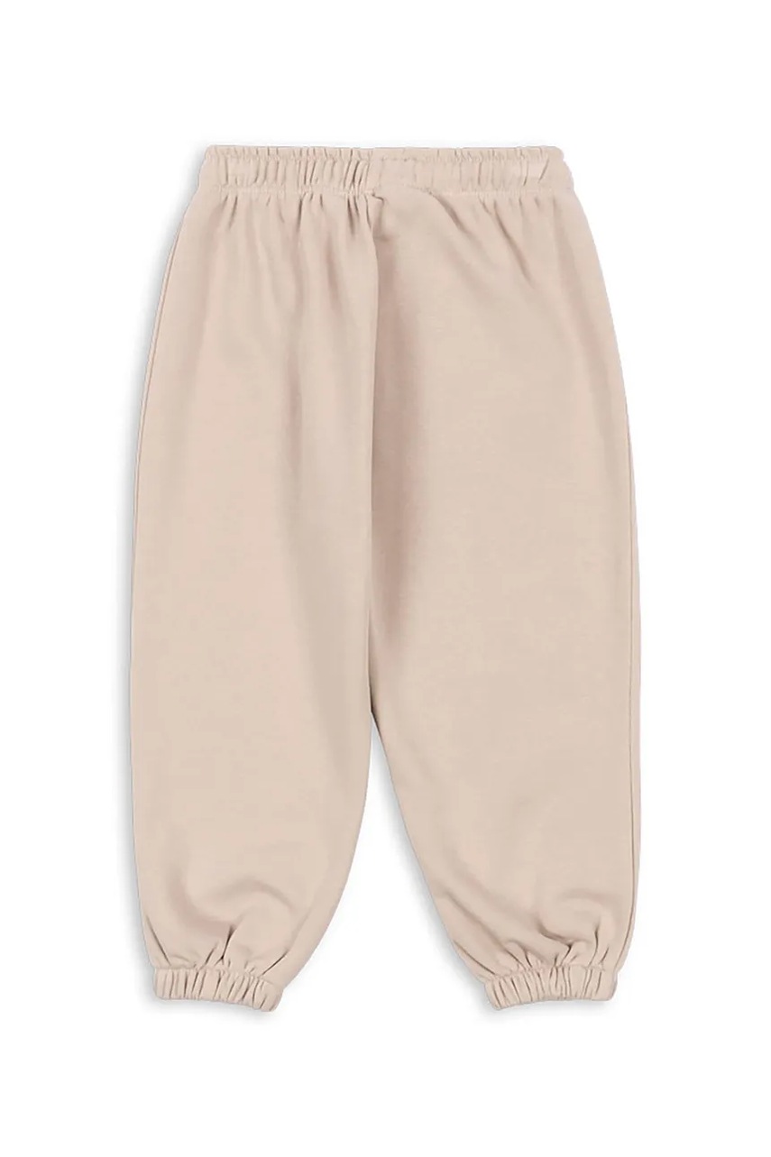 Детские брюки Konges Sløjd LOU SWEAT PANTS OCS цвет бежевый однотонные KS103867