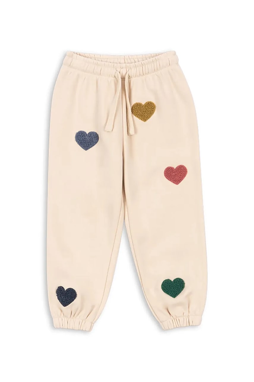Levně Dětské tepláky Konges Sløjd LOU TERRY SWEAT PANTS OCS béžová barva, s aplikací, KS103870