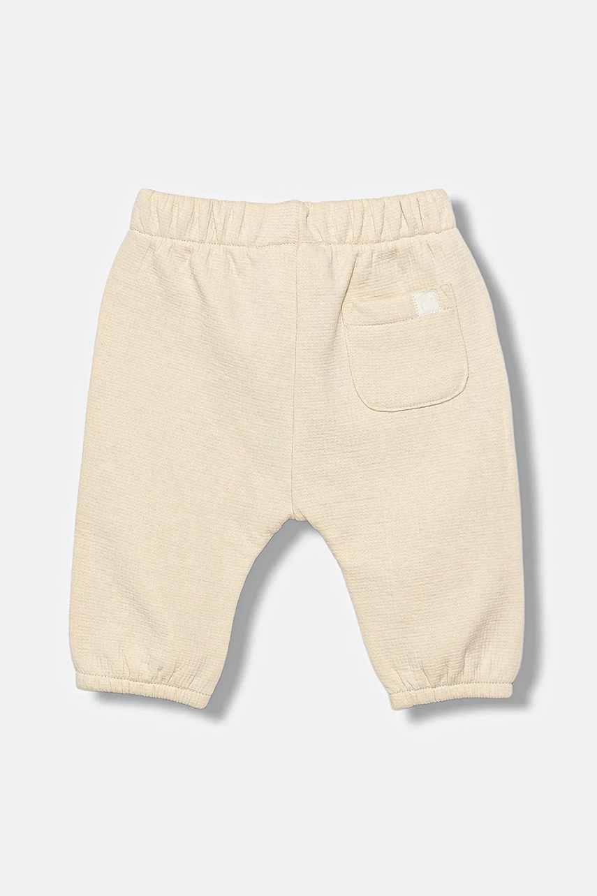Детские спортивные штаны United Colors of Benetton цвет бежевый однотонные 3ITEAF02E Детские спортивные штаны United Colors of Benetton цвет бежевый однотонные 3ITEAF02E