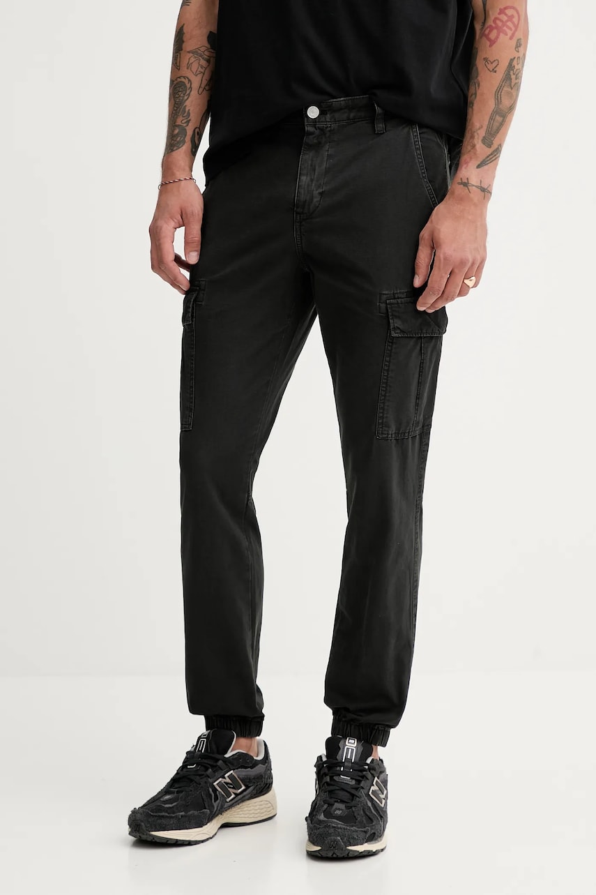Levně Bavlněné kalhoty Tommy Jeans pánské, černá barva, přiléhavé, DM0DM21791