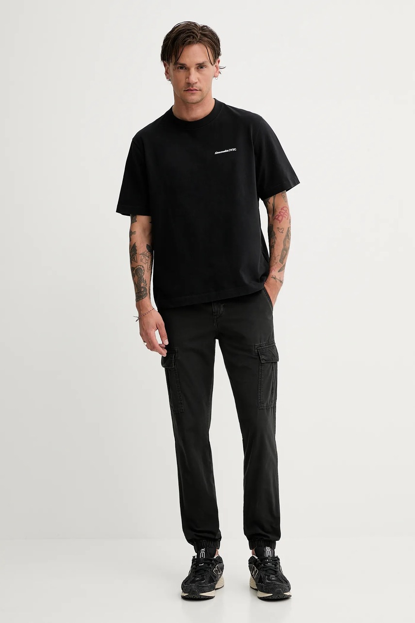 Хлопковые брюки Tommy Jeans цвет чёрный облегающие DM0DM21791