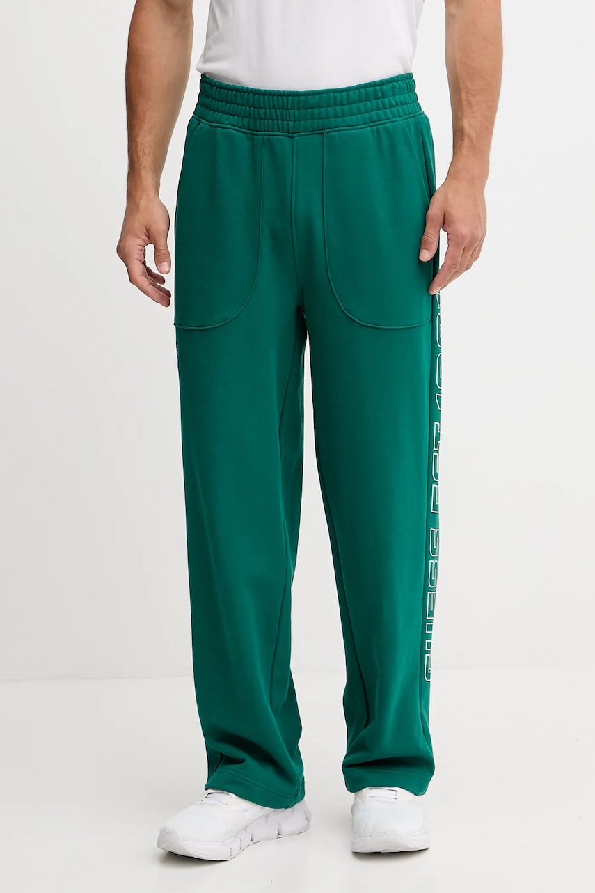 Levně Bavlněné tepláky Guess MENTORE pánské, zelená barva, s potiskem, Z5YB00 KCE91