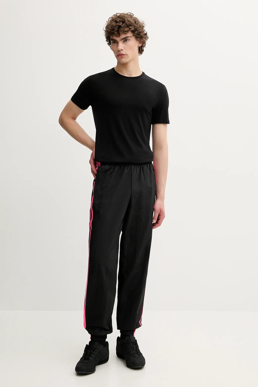 Спортивные штаны adidas Originals Firebird цвет чёрный с аппликацией JY1338