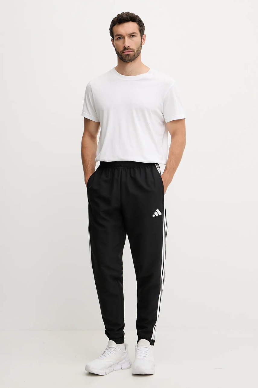 Тренировочные брюки adidas Performance Tiro Essentials цвет чёрный узор JC5445