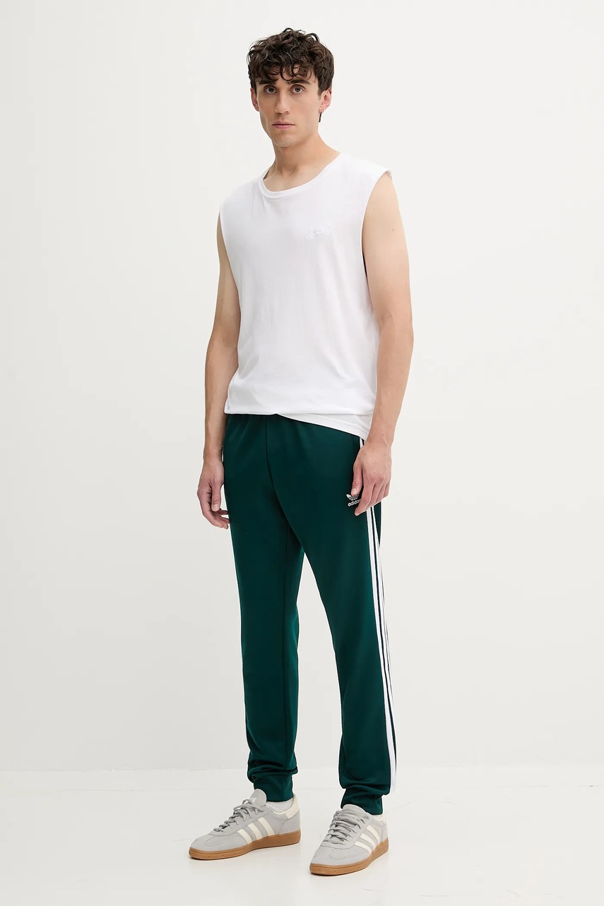 Спортивные штаны adidas Originals Sst Tp цвет зелёный с аппликацией JY1288