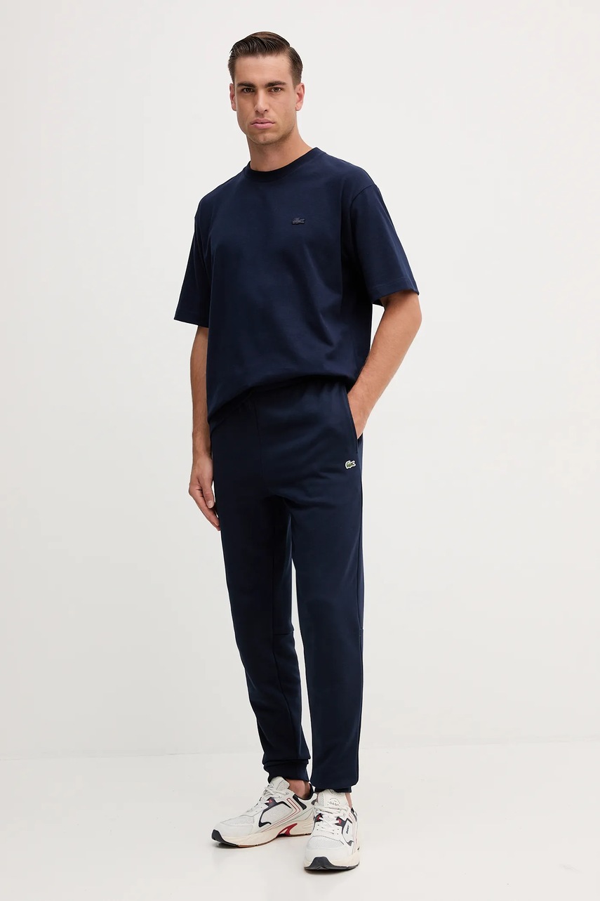 Хлопковые спортивные штаны Lacoste цвет синий однотонные XH9833 Хлопковые спортивные штаны Lacoste цвет синий однотонные XH9833