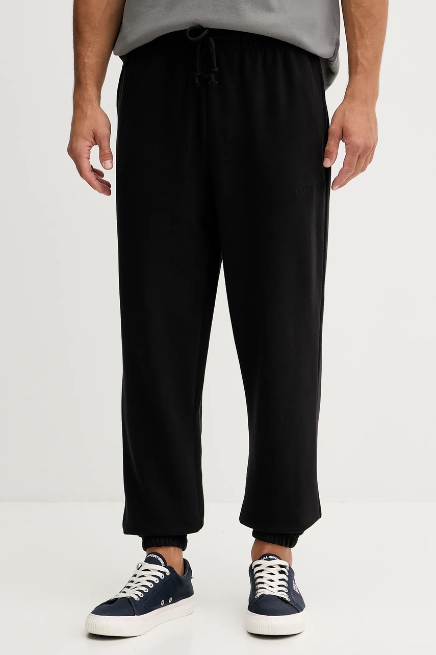 Levně Tepláky Calvin Klein Underwear pánské, černá barva, LV00NM2931