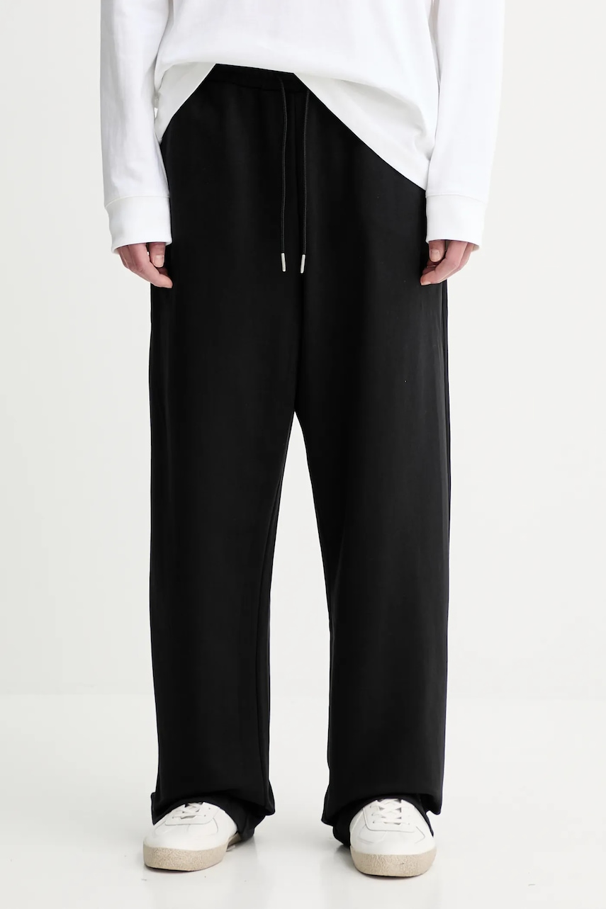 Levně Tepláky Calvin Klein pánské, černá barva, s aplikací, LV04LD239G