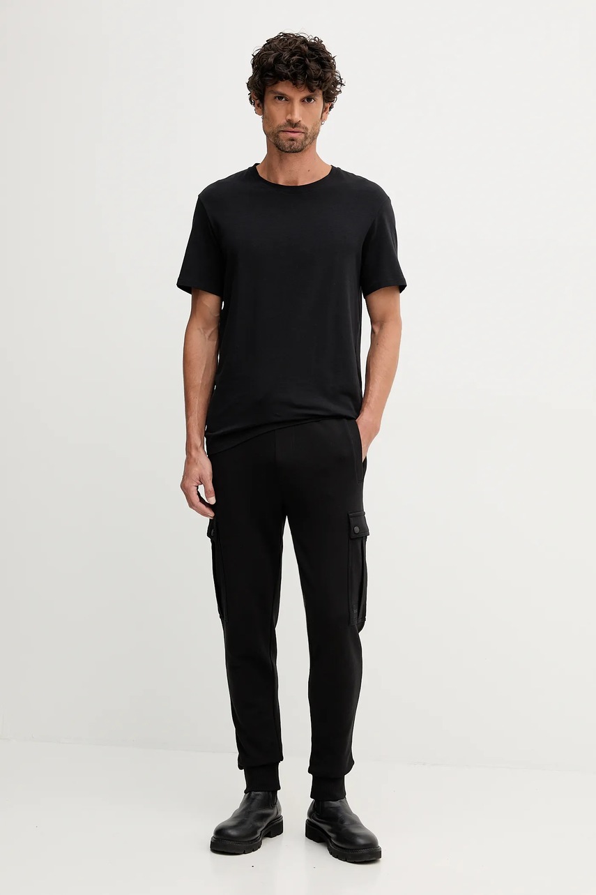 Хлопковые спортивные штаны BOSS Orange цвет чёрный однотонные 50542917