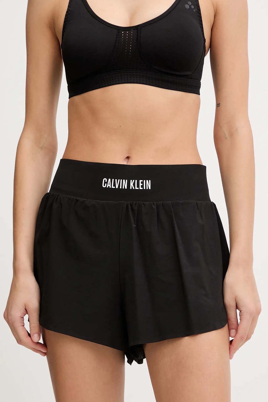 Levně Tréninkové šortky Calvin Klein Performance dámské, černá barva, high waist, LVGWF5S801