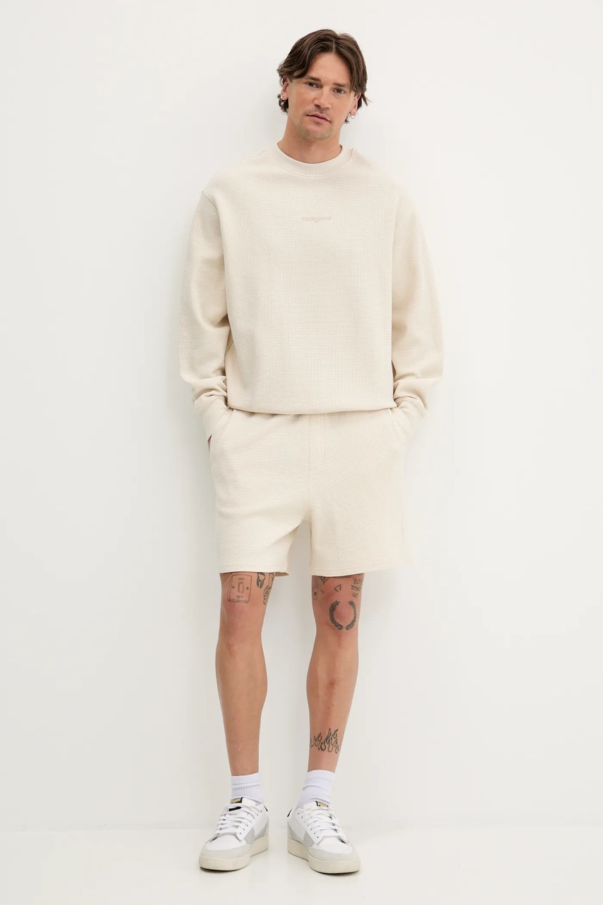 Хлопковые шорты Tommy Jeans цвет бежевый DM0DM21805