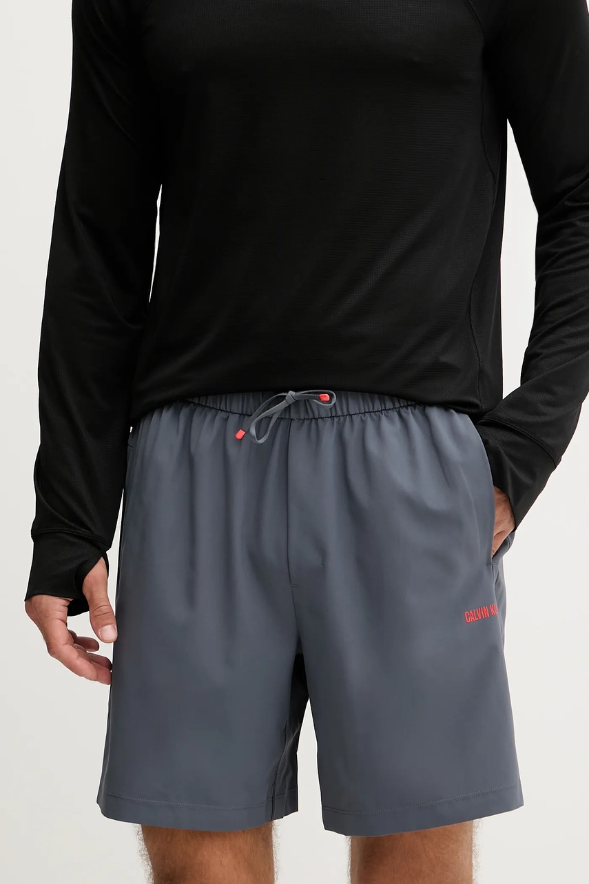 Levně Tréninkové šortky Calvin Klein Performance pánské, šedá barva, LVGMF5S803