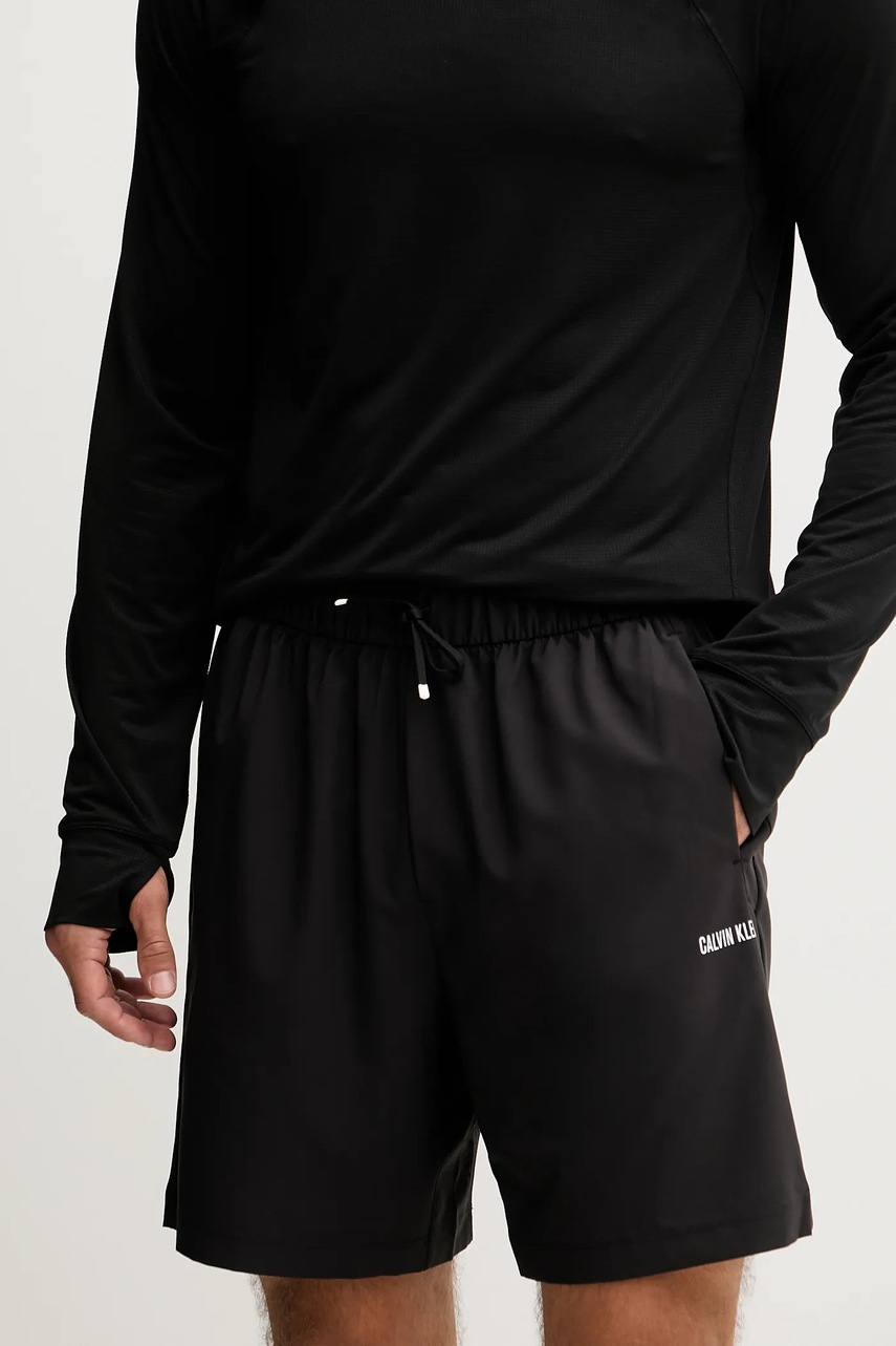 Levně Tréninkové šortky Calvin Klein Performance pánské, černá barva, LVGMF5S803