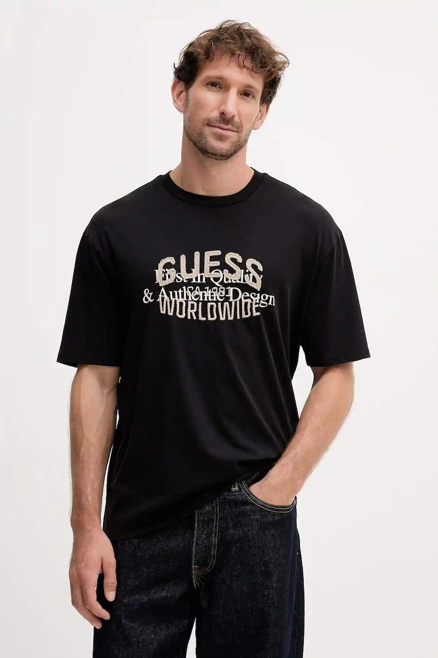 Levně Bavlněné tričko Guess WORLDWIDE pánské, černá barva, s potiskem, M5YI49 KBW41