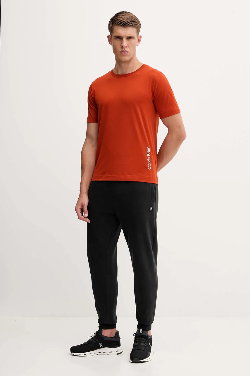 Футболка Calvin Klein Performance цвет оранжевый с принтом LVGMF5K106