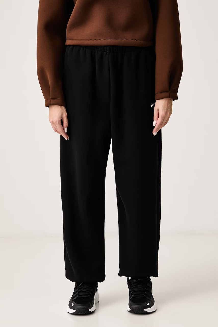 Nike Sportswear donji dio trenirke za žene s pamukom Studio Fleece