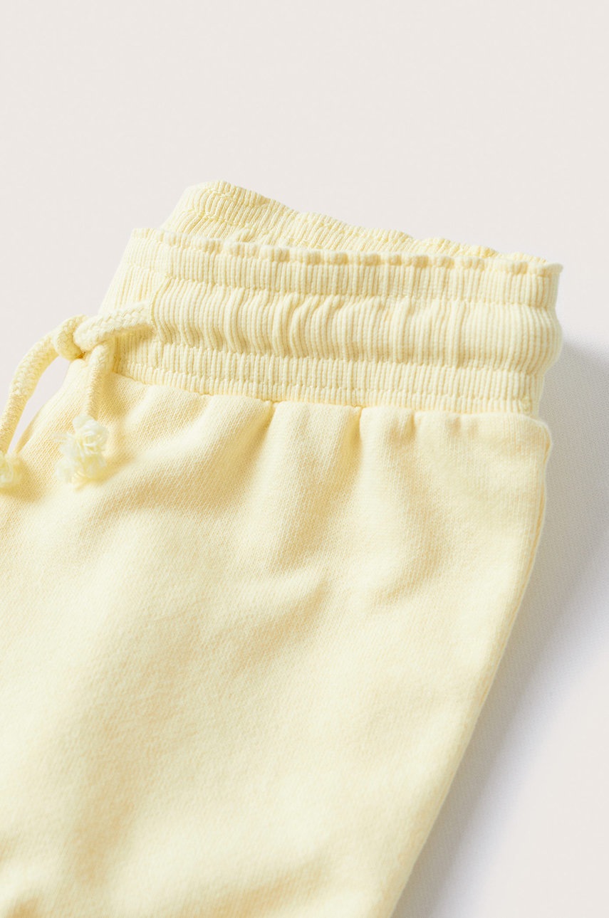 

Дитячі бавовняні штани Mango Kids колір жовтий однотонні