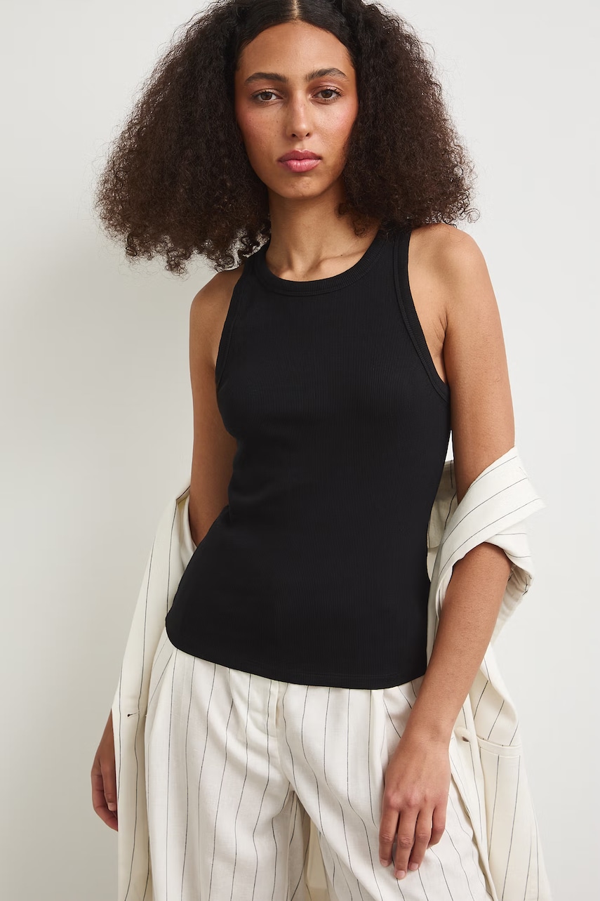 Medicine top da donna in cotone con elastan nero