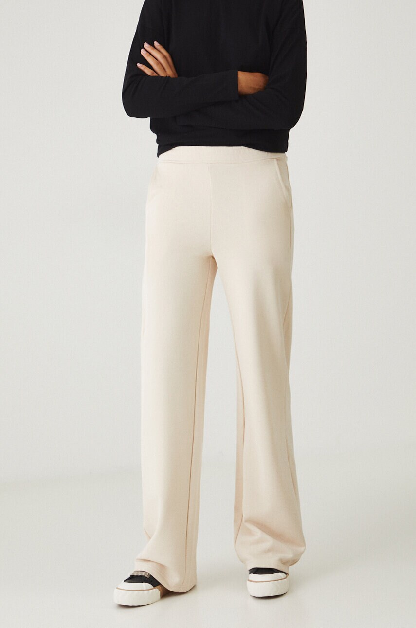 Medicine pantaloni de trening din bumbac culoarea bej, neted