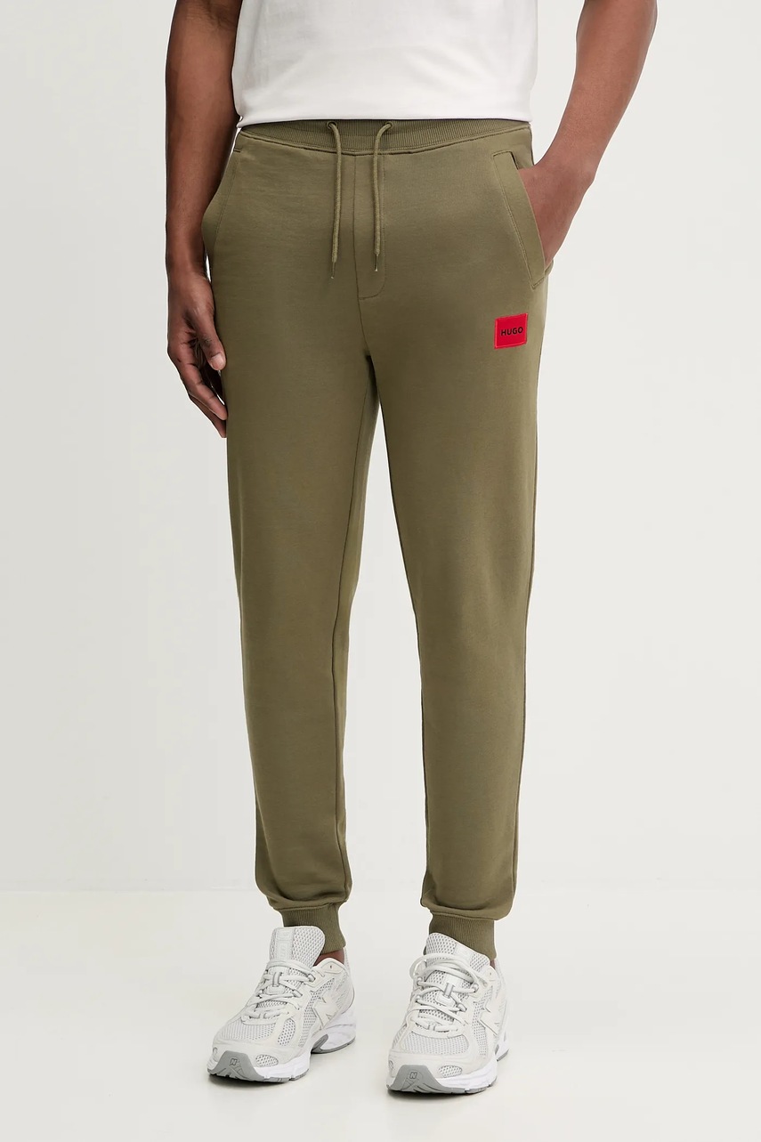 Levně Bavlněné tepláky HUGO Doak212 černá barva, 50447963