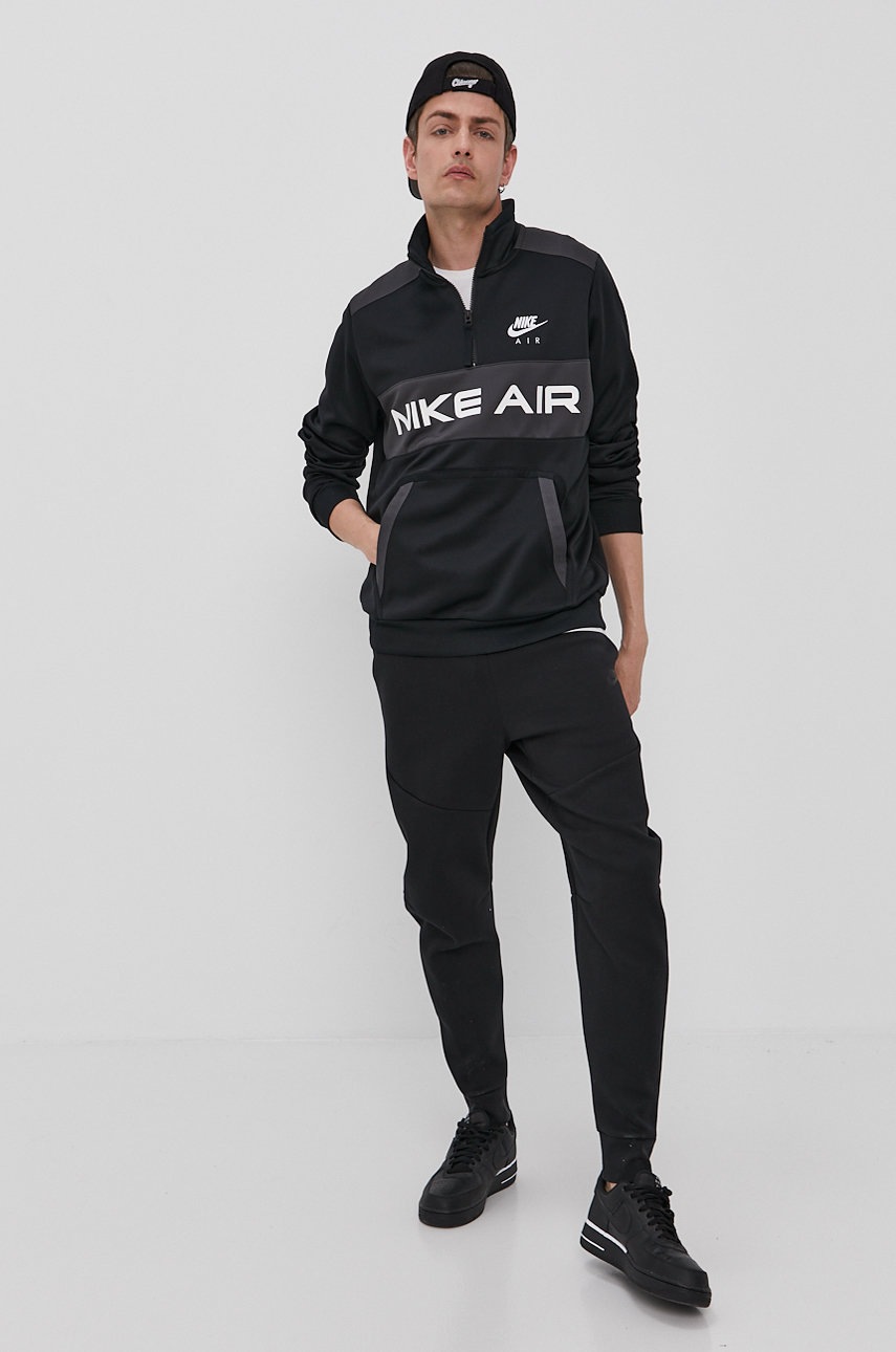 

Брюки Nike Sportswear мужские цвет чёрный гладкие