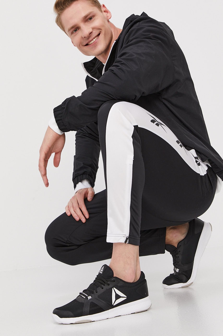 

Штани Reebok GL3153 чоловічі колір чорний з аплікацією