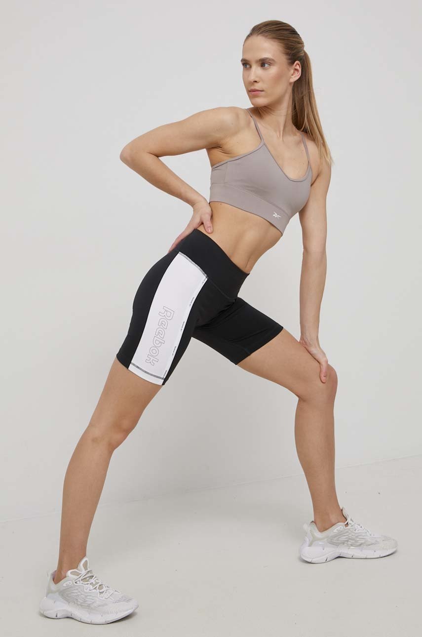 

Спортивный бюстгальтер Reebok H65610 цвет бежевый однотонный