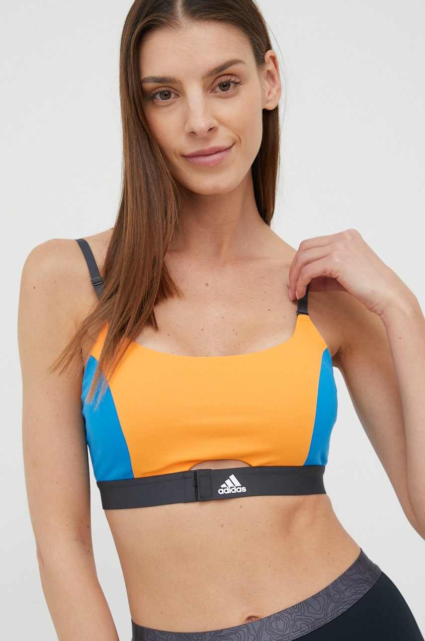 Levně Sportovní podprsenka adidas Performance Aeroimpact Luxe HG4348 oranžová barva