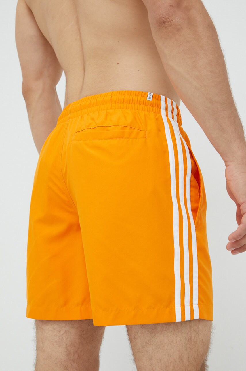 

Купальні шорти adidas Originals Adicolor колір помаранчевий