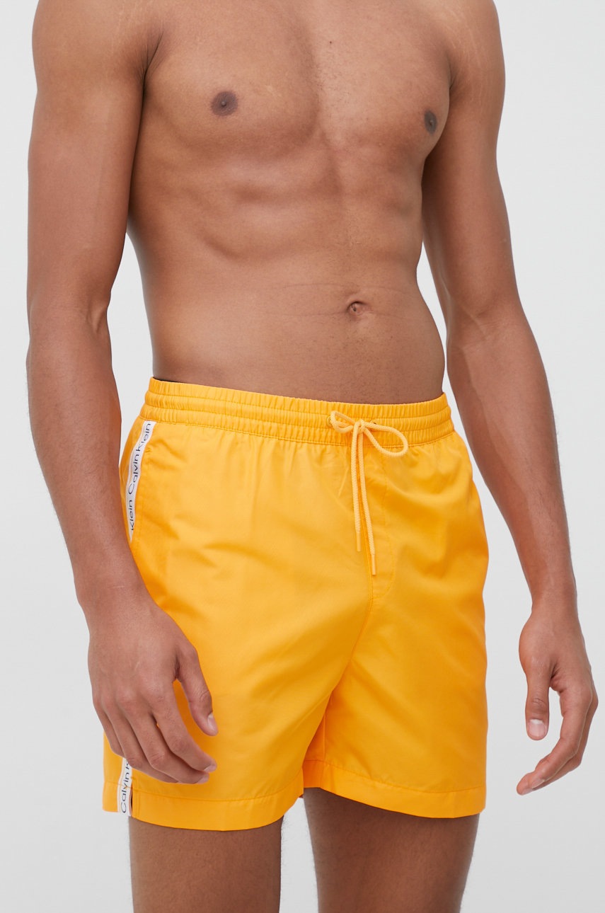 

Плувни шорти Calvin Klein в жълто, Оранжев
