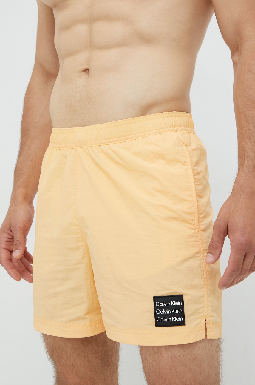 

Плувни шорти Calvin Klein в бежово, Оранжев