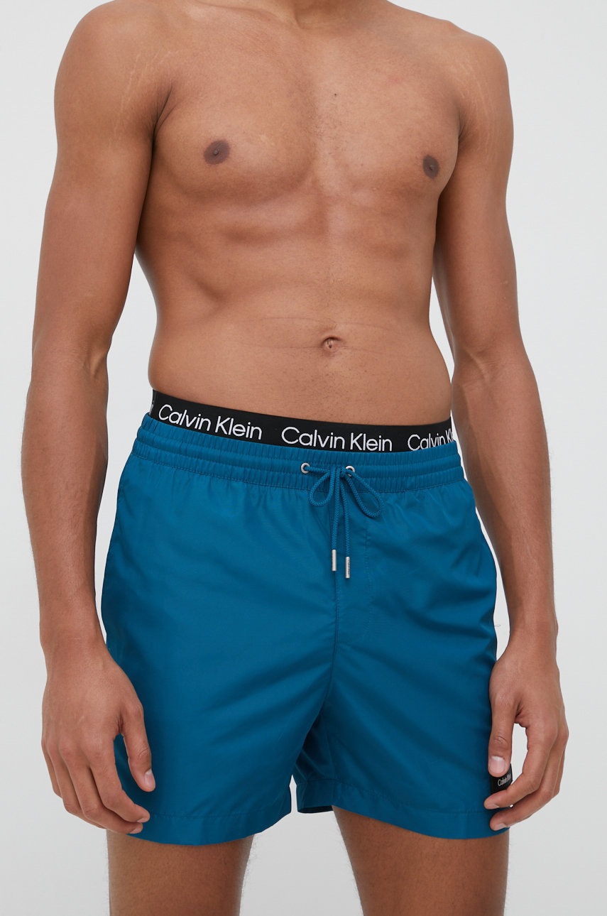 

Плувни шорти Calvin Klein в тъмносиньо, Тюркоазен