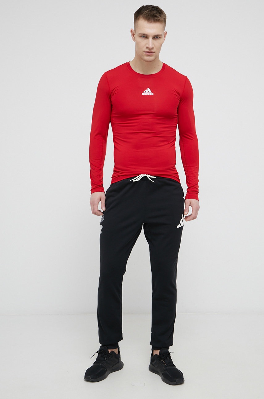 

Лонгслів для тренувань adidas Performance GU7336 колір червоний однотонний