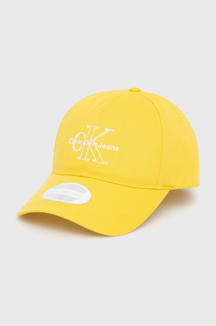 Calvin Klein Jeans czapka bawełniana kolor żółty z aplikacją