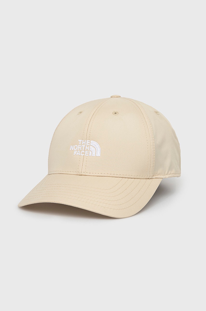 

Шапка The North Face в бежово с апликация, Бежов