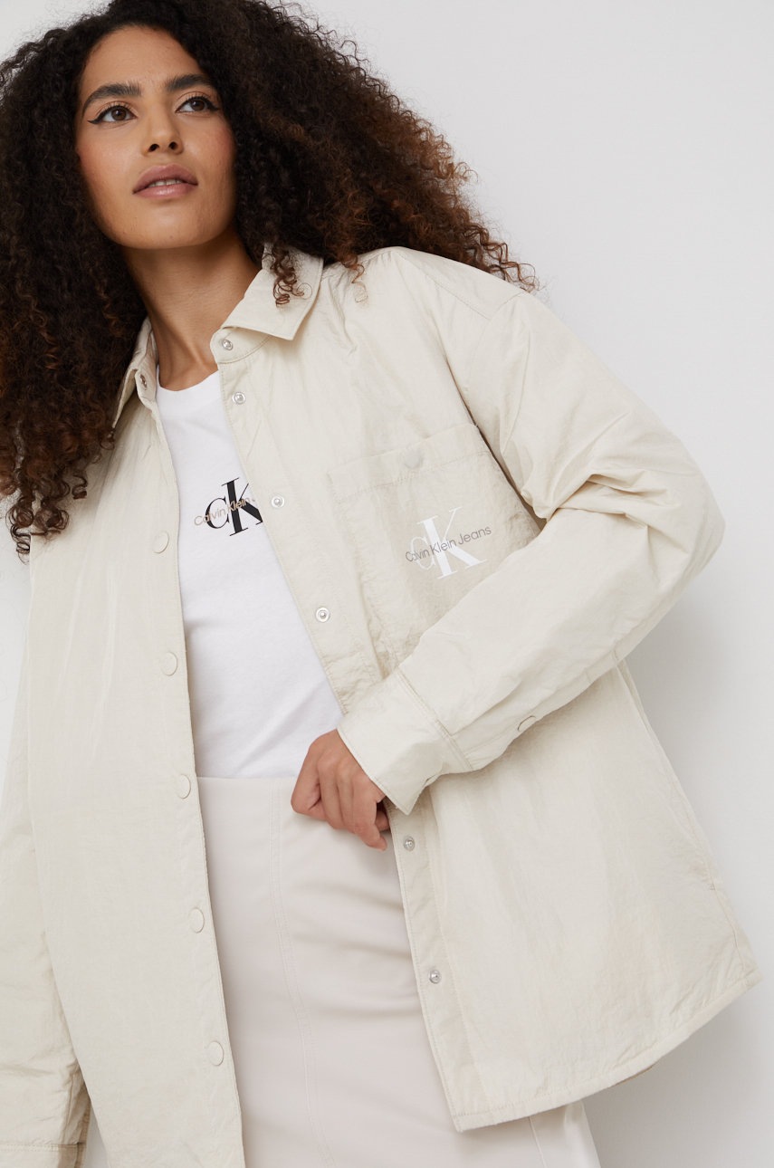 oboustranna-bunda-calvin-klein-jeans-damska-bezova-barva-prechodna