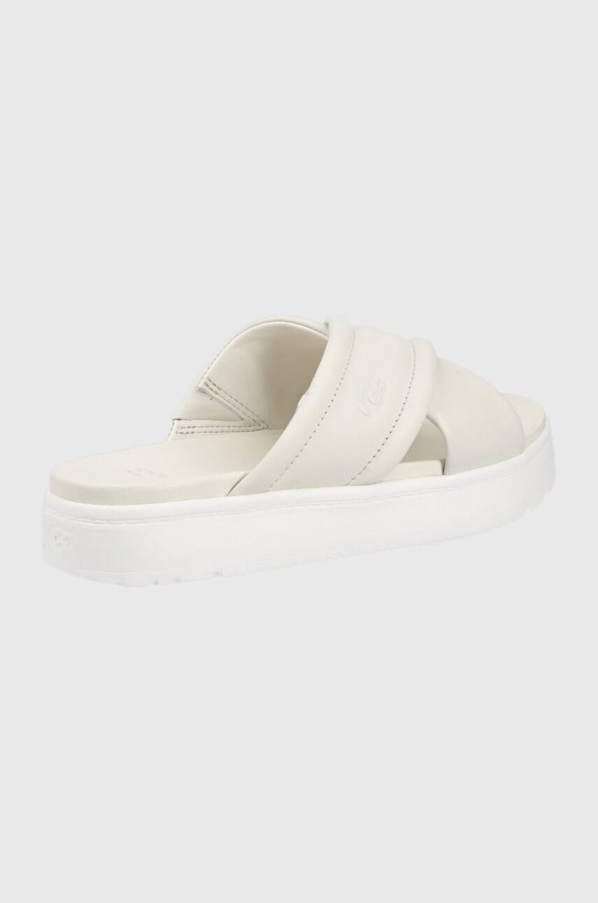 

Шкіряні шльопанці UGG Zayne Crossband жіночі колір бежевий на платформі