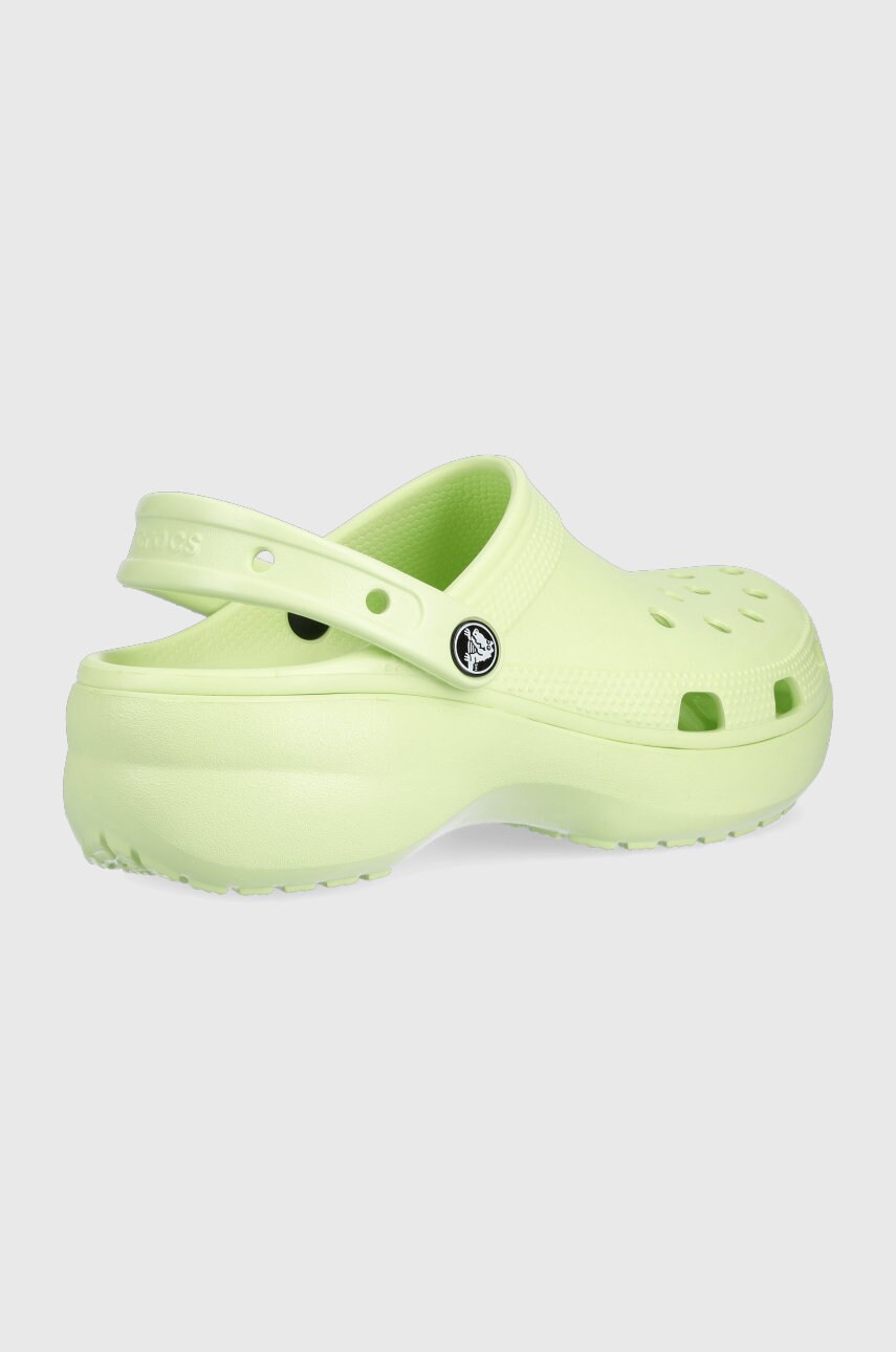 

Шльопанці Crocs жіночі колір зелений на платформі