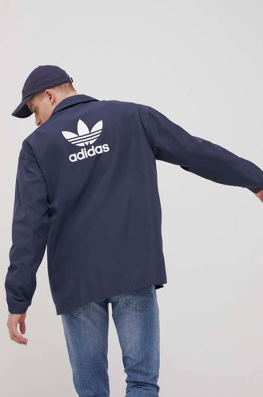 Levně Bunda adidas Originals HD9770 pánská, tmavomodrá barva, přechodná, oversize